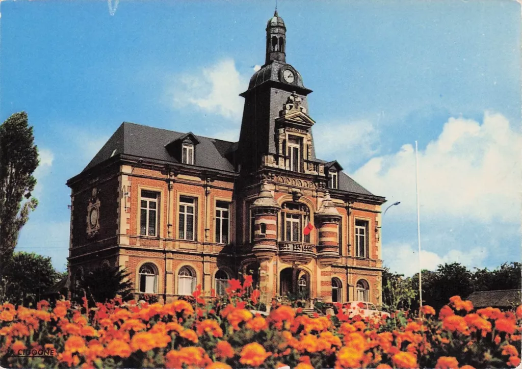 Bâtiment historique avec jardin fleuri en premier plan